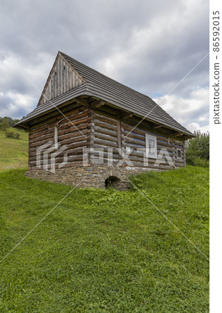 Old wooden houses in village Osturna, Spiska magura region, Slovakia Old wooden houses in village Osturna, Spiska magura region, Slovakia 86592015