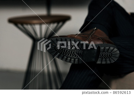 feet in stylish shoes 86592613