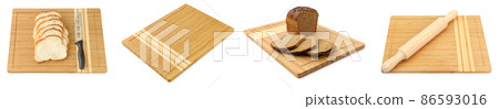 Breadboard for cutting bread, rolling pin and bread isolated on white 86593016