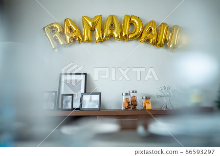 Ramadan gold balloon text on the wall 86593297
