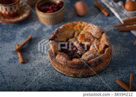 Breaded rustic pie with berries Breaded rustic pie with berries 86594212