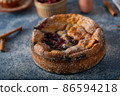 Breaded rustic pie with berries 86594218