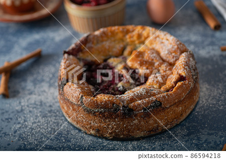 Breaded rustic pie with berries Breaded rustic pie with berries 86594218