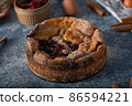 Breaded rustic pie with berries 86594221