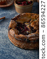 Breaded rustic pie with berries 86594227
