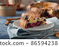 Breaded rustic pie with berries 86594238