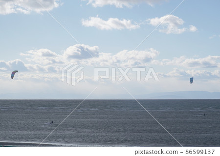 Marine sports kite board using kite Marine sports kite board using kite 86599137