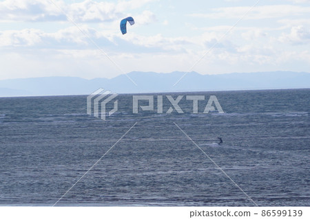 Marine sports kite board using kite Marine sports kite board using kite 86599139