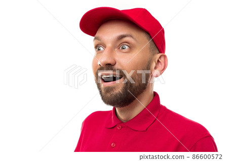 close-up portrait of a delivery courier wearing a red uniform 86600572