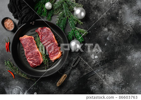 New year Marbled beef , on black dark stone table background, top view flat lay, with copy space for text 86603763