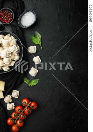 , on black background , top view flat lay , with copyspace and space for text 86604143