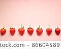 Rows of red strawberries with copy space 86604589