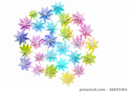 Closeup of delicious colorful meringue cookies isolated on white background. Sweet decor. Confectionery  86605064