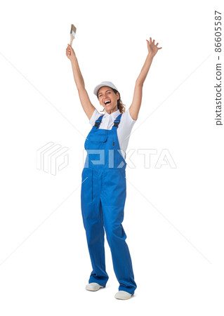 Female house painter with paint brush Female house painter with paint brush 86605587