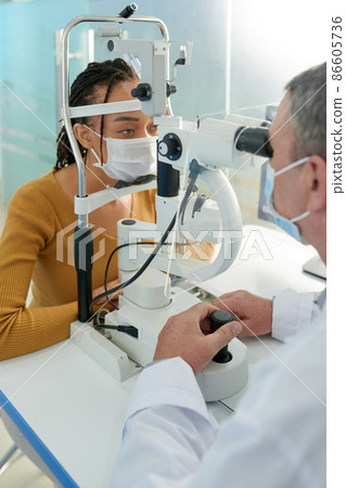 Optometrist Measuring Pressure Within Eyes 86605736