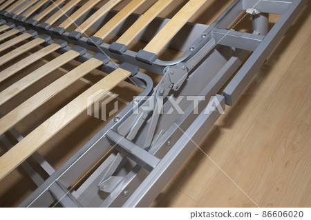 Slatted bottom and sofa folding mechanism close-up 86606020