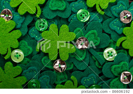 Handmade clover leaves flat lay background Handmade clover leaves flat lay background 86606192