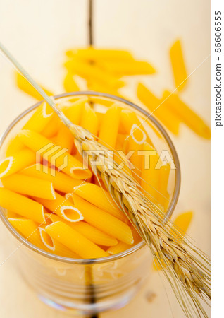 Italian pasta penne with wheat Italian pasta penne with wheat 86606555