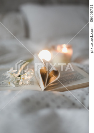 Book with pages folded into a heart shape. valentine's festive background  86606731