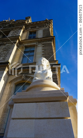 Architectural details of Louvre Museum in Paris, France. This central landmark of Paris is one of the world's largest museums. Architectural details of Louvre Museum in Paris, France. This central landmark of Paris is one of the world's largest museums. 86607915