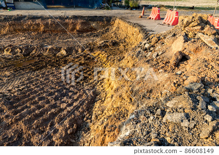 Side of the broken asphalt road collapsed and fallen.  86608149