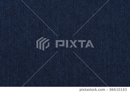 Blue jeans texture. Dark blue denim background. Blue jeans texture. Dark blue denim background. 86610183