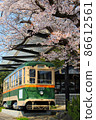 Sendai tram railroad car and cherry blossoms in full bloom in Akiu Onsen 86612561