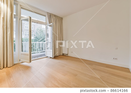 Interior of an empty room with balcony Interior of an empty room with balcony 86614166