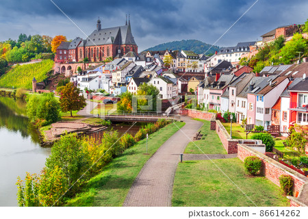 Saarburg, Germany - Old town and Saint Laurentius church. 86614262