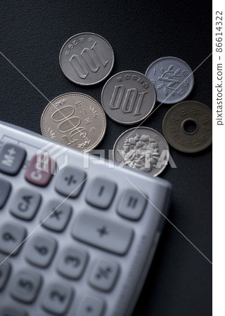 Coin and calculator Coin and calculator 86614322