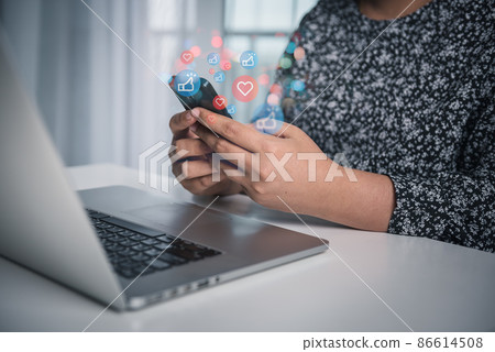 Social Media and Technology Internet Communication Connection Concept. Business Woman's Hands is Using Social Media Via Smartphone With Notification Icon. Technology Digital Media Mobile Phone Network Social Media and Technology Internet Communication Connection Concept. Business Woman's Hands is Using Social Media Via Smartphone With Notification Icon. Technology Digital Media Mobile Phone Network 86614508