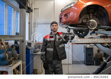 Portrait of Mechanic in Autobody Shop Portrait of Mechanic in Autobody Shop 86616868