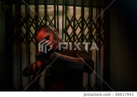Female Soldier Holding Gun 86617041