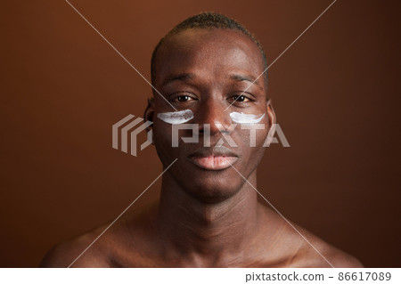 Man caring about the skin on his face Man caring about the skin on his face 86617089