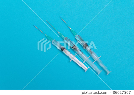 Several Syringe on Blue Table 86617507