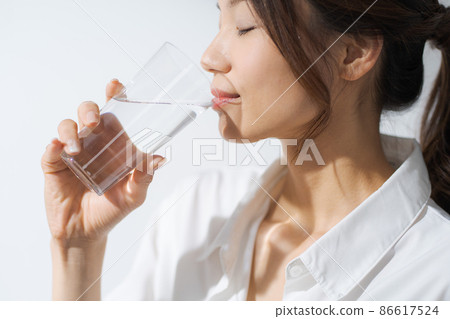 Female drinking water Natural 86617524