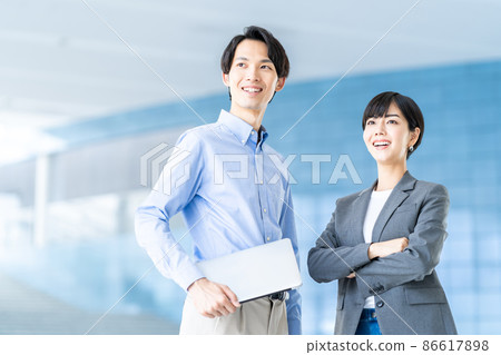 A business person standing in the aisle. 86617898