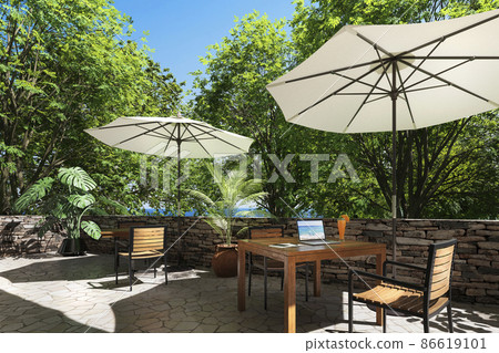 Image of a sunny afternoon open terrace and a table with a laptop / resort work Image of a sunny afternoon open terrace and a table with a laptop / resort work 86619101