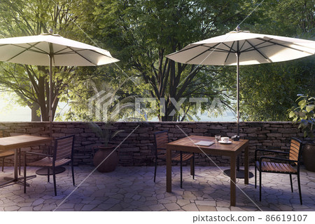 An image of an open terrace with a refreshing sunrise and a table with coffee / resort work 86619107