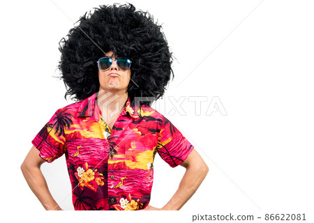 Confident man in Afro wig pouting lips Confident man in Afro wig pouting lips 86622081