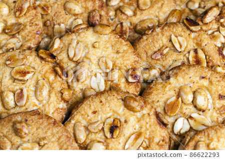 wheat-oatmeal cookies with peanuts, closeup wheat-oatmeal cookies with peanuts, closeup 86622293