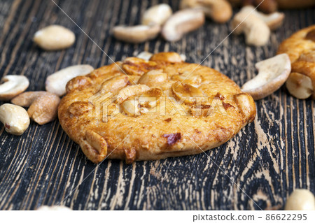 wheat-oatmeal cookies with peanuts, closeup wheat-oatmeal cookies with peanuts, closeup 86622295