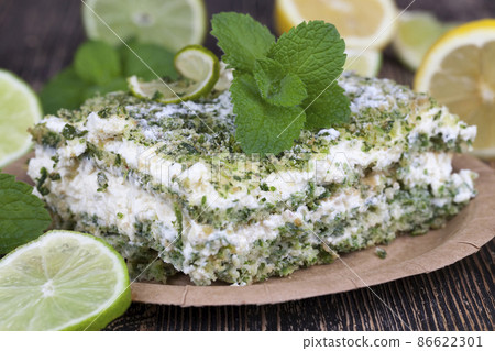 green cake with cream and lime green cake with cream and lime 86622301