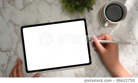 Overhead shot, A female using stylus pen drawing graphic on digital tablet Overhead shot, A female using stylus pen drawing graphic on digital tablet 86622750