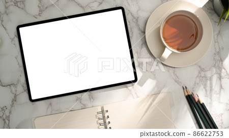 Modern working space with tablet touchpad mockup on marble background. Modern working space with tablet touchpad mockup on marble background. 86622753