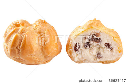 Sweet profiteroles with cottage cheese and raisins isolated on white 86625437