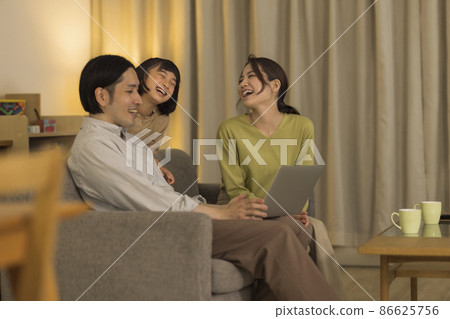 Family computer spent in the living room at night Family computer spent in the living room at night 86625756