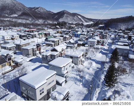 Residential area the day after heavy snowfall (aerial view) Residential area the day after heavy snowfall (aerial view) 86625808