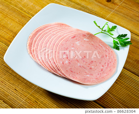 Slices of chopped pork ham sausage Slices of chopped pork ham sausage 86628304