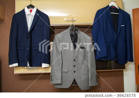 Stylish three-piece suit. Men's jacket on a mannequin. Men's Clothing Stylish three-piece suit. Men's jacket on a mannequin. Men's Clothing 86628578